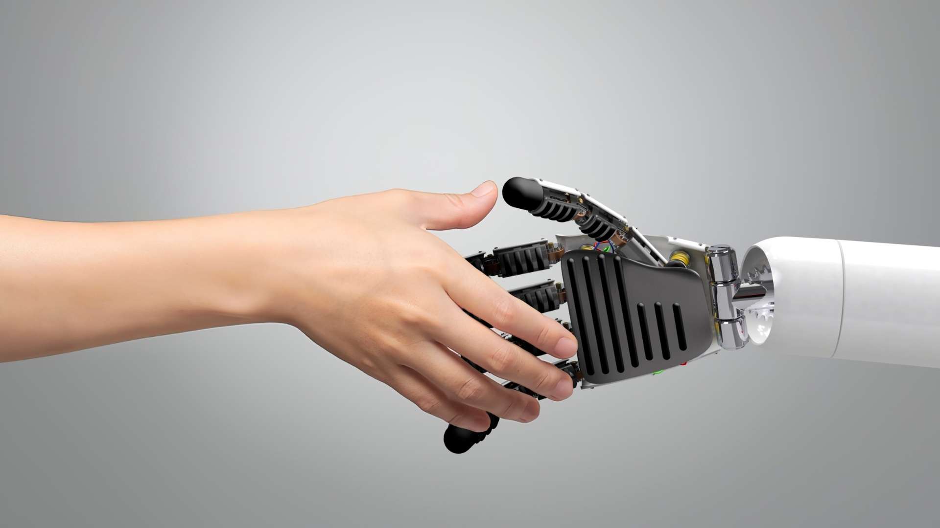 A human hand shaking a robotic hand, symbolizing the agreement made with an AI-drafted contract.