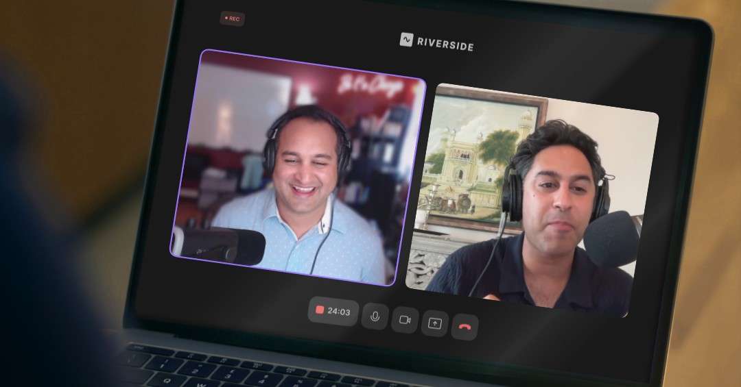 A businessman in a suit reviews tax documents at a desk with a laptop, while Pankaj Raval and Sahil Chaudry discuss in the background, with a city skyline visible.
