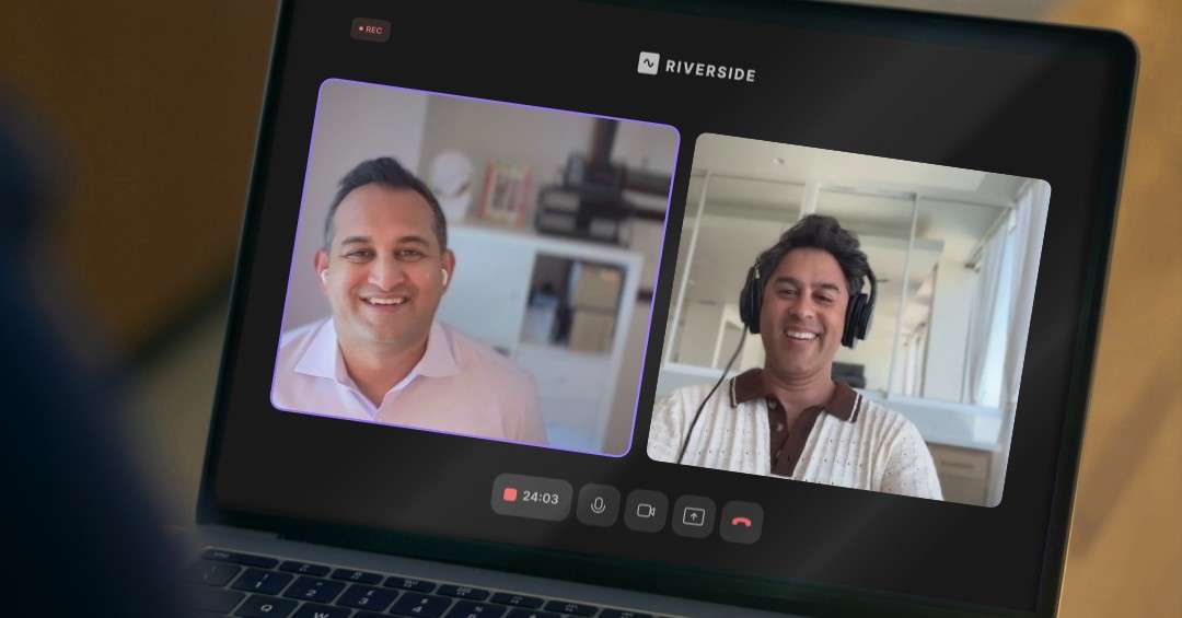 Two podcast hosts smile during a recorded Riverside video session shown on a laptop screen, representing the Letters of Intent episode on mindfulness and meditation for dealmakers.
